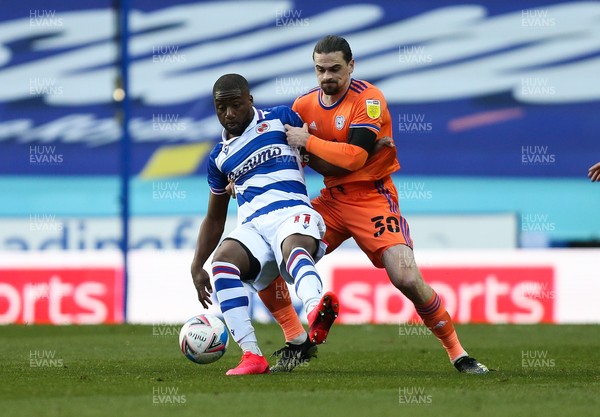 160421 Reading v Cardiff City, Sky Bet Championship - Ciaron Brown of Cardiff City and Yakou Meite of Reading compete for the ball