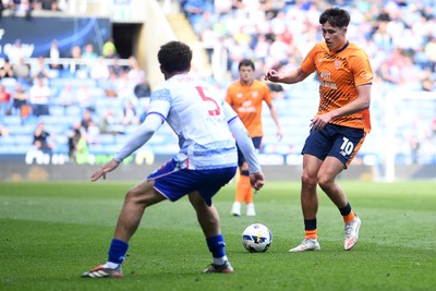 180426 - Reading v Cardiff City - Sky Bet League 1 - Rubin Colwill of Cardiff City is challenged by Haydon Roberts of Reading