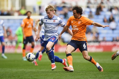 180426 - Reading v Cardiff City - Sky Bet League 1 - Ryan Wintle of Cardiff City is challenged by Paddy Lane of Reading