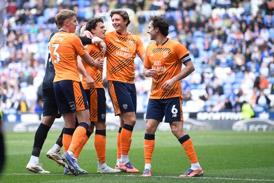 180426 - Reading v Cardiff City - Sky Bet League 1 - Perry NG of Cardiff City celebrates scoring a goal with team mates