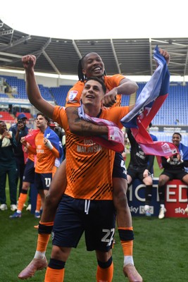180426 - Reading v Cardiff City - Sky Bet League 1 - Yousef Salech of Cardiff City and Gabriel Osho of Cardiff City celebrate at full time after securing promotion back to the Championship