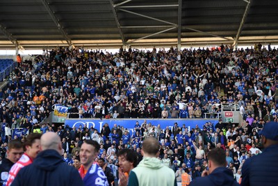 180426 - Reading v Cardiff City - Sky Bet League 1 - Cardiff fans celebrate at full time after securing promotion back to the Championship