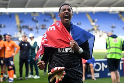 180426 - Reading v Cardiff City - Sky Bet League 1 - Nathan Trott of Cardiff City celebrates at full time after securing promotion back to the Championship