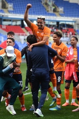 180426 - Reading v Cardiff City - Sky Bet League 1 - Brian Barry-Murphy, Cardiff City Manager picks up Callum Robinson of Cardiff City to celebrate at full time after securing promotion back to the Championship