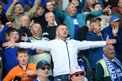 180426 - Reading v Cardiff City - Sky Bet League 1 - Cardiff fans celebrate at full time after securing promotion back to the Championship