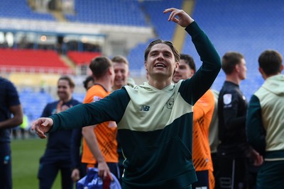 180426 - Reading v Cardiff City - Sky Bet League 1 - Cian Ashford of Cardiff City celebrates at full time after securing promotion back to the Championship