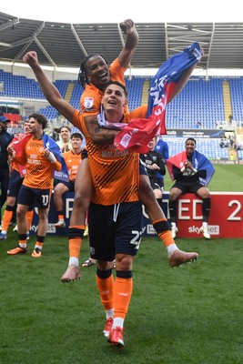 180426 - Reading v Cardiff City - Sky Bet League 1 - Yousef Salech of Cardiff City and Gabriel Osho of Cardiff City celebrate at full time after securing promotion back to the Championship