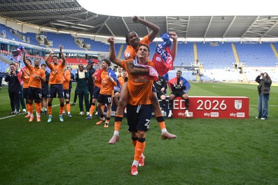 180426 - Reading v Cardiff City - Sky Bet League 1 - Yousef Salech of Cardiff City and Gabriel Osho of Cardiff City celebrate at full time after securing promotion back to the Championship