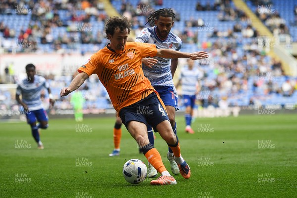 180426 - Reading v Cardiff City - Sky Bet League 1 - Ryan Wintle of Cardiff City is challenged by Andy Rinomhota of Reading