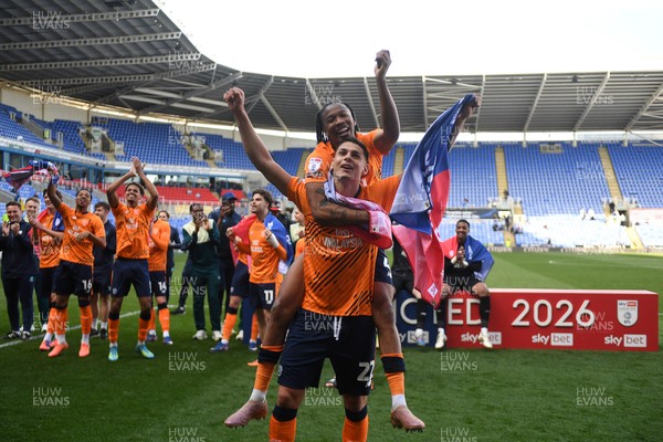 180426 - Reading v Cardiff City - Sky Bet League 1 - Yousef Salech of Cardiff City and Gabriel Osho of Cardiff City celebrate at full time after securing promotion back to the Championship