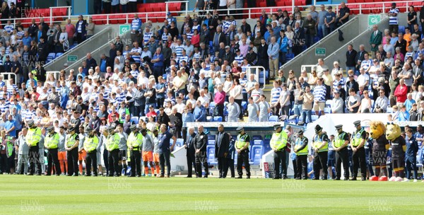 180819 - Reading v Cardiff City, Sky Bet Championship - Police officers observe a minutes silence at the start of the match in memory of PC Andrew Harper who was killed recently while attending a burglary