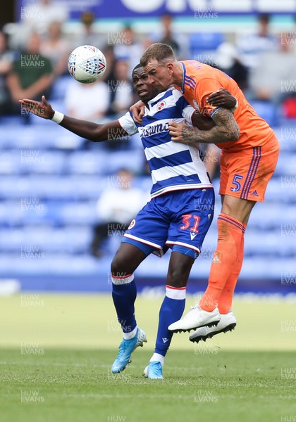 180819 - Reading v Cardiff City, Sky Bet Championship - Aden Flint of Cardiff City and Lucas Joao of Reading compete for the ball