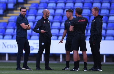 100821 - Reading v Swansea City - Carabao Cup - Swansea City Manager Russell Martin with Luke Williams, Dean Thornton and Alan Tate ahead of kick off