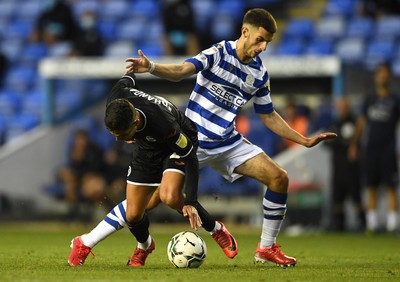 100821 - Reading v Swansea City - Carabao Cup - Yan Dhanda of Swansea City is tackled by Dejan Tetek of Reading