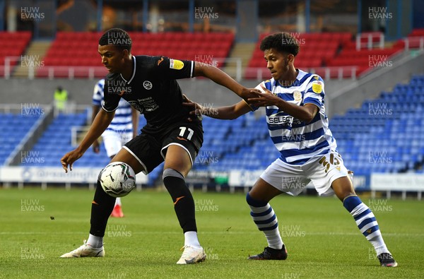100821 - Reading v Swansea City - Carabao Cup - Morgan Whittaker of Swansea City is tackled by Claudio Gomes of Reading