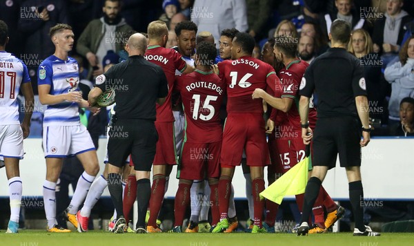 190917 - Reading v Swansea City - Carabao Cup - An altercation between the teams involving Tiago Ilori of Reading, Martin Olsson and Renato Sanches of Swansea City as they walk off for half time