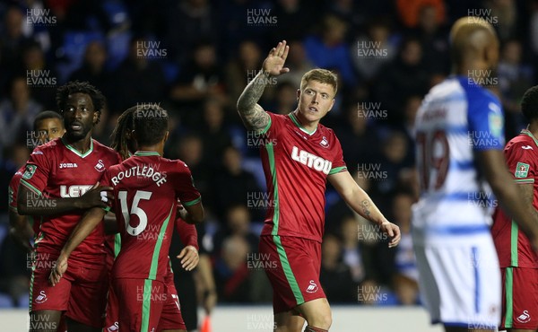 190917 - Reading v Swansea City - Carabao Cup - Alfie Mawson of Swansea City celebrates scoring a goal with team mates