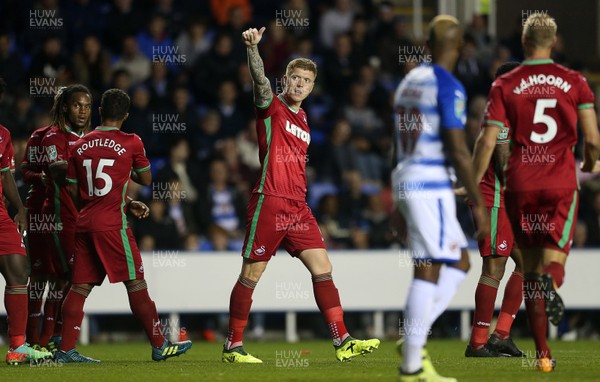 190917 - Reading v Swansea City - Carabao Cup - Alfie Mawson of Swansea City celebrates scoring a goal with team mates