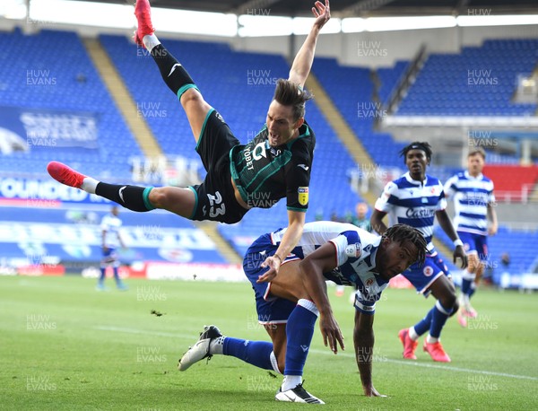 220720 - Reading v Swansea City - EFL SkyBet Championship - Connor Roberts of Swansea City and Liam Moore of Reading collide