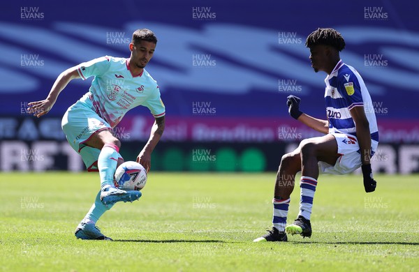 250421 - Reading v Swansea City - SkyBet Championship - Kyle Naughton of Swansea City is challenged by Ovie Ejaria of Reading