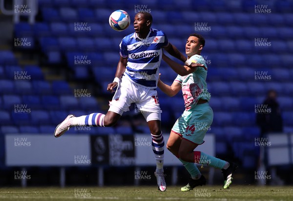 250421 - Reading v Swansea City - SkyBet Championship - Lucas Joao of Reading is challenged by Ben Cabango of Swansea City