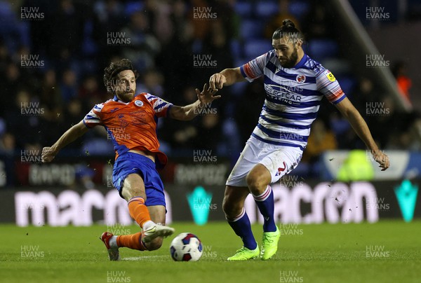 271222 - Reading v Swansea City - SkyBet Championship - Joe Allen of Swansea City is tackled by Andy Carroll of Reading