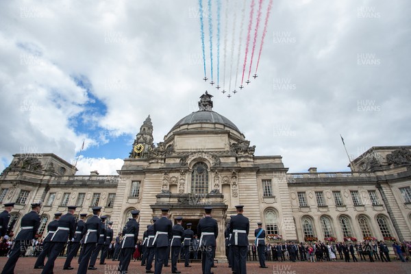 160921 - Picture shows the Red Arrows flying over Cardiff City Hall to open a new exhibition of Wales's effort in the Battle of Britain