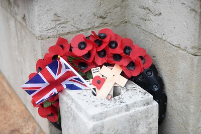 111125 - Remembrance Day - Tributes and wreaths left at the Newport Cenotaph after the a Remembrance memorial service on Sunday