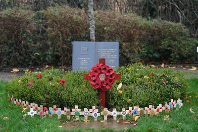 111125 - Remembrance Day - Tributes and wreaths left at the Newport Cenotaph after the a Remembrance memorial service on Sunday