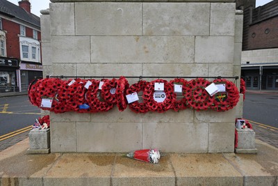 111125 - Remembrance Day - Tributes and wreaths left at the Newport Cenotaph after the a Remembrance memorial service on Sunday