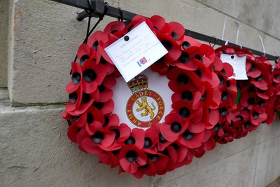 111125 - Remembrance Day - Tributes and wreaths left at the Newport Cenotaph after the a Remembrance memorial service on Sunday