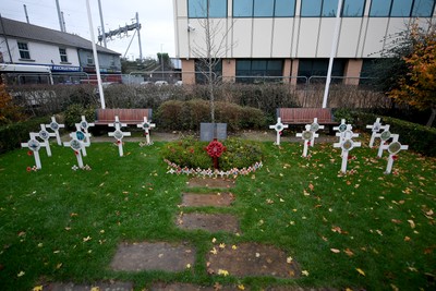 111125 - Remembrance Day - Tributes and wreaths left at the Newport Cenotaph after the a Remembrance memorial service on Sunday