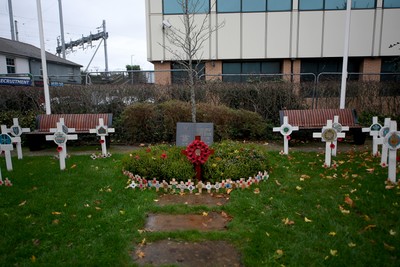 111125 - Remembrance Day - Tributes and wreaths left at the Newport Cenotaph after the a Remembrance memorial service on Sunday