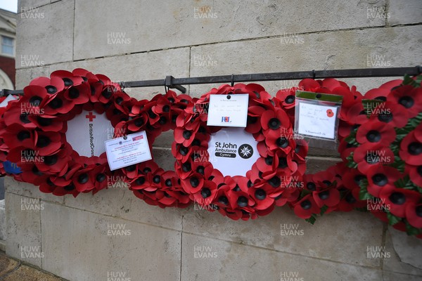 111125 - Remembrance Day - Tributes and wreaths left at the Newport Cenotaph after the a Remembrance memorial service on Sunday