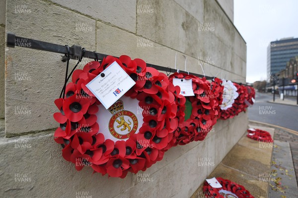 111125 - Remembrance Day - Tributes and wreaths left at the Newport Cenotaph after the a Remembrance memorial service on Sunday