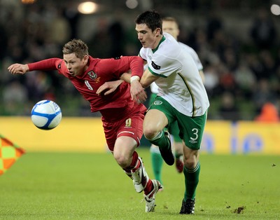 08.02.11 - Republic of Ireland v Wales - Carling Nations Cup -  Ireland's Ciaran Clark tackles Simon Church of Wales 