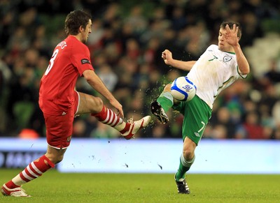 08.02.11 - Republic of Ireland v Wales - Carling Nations Cup -  Seamus Coleman of Ireland challenges Sam Ricketts of Wales for the ball 