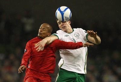 08.02.11 - Republic of Ireland v Wales - Carling Nations Cup -  Wales' Robert Earnshaw challenges Ciaran Clark of Ireland for the ball 