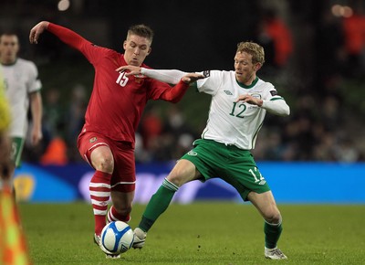 08.02.11 - Republic of Ireland v Wales - Carling Nations Cup -  Ireland's Paul Green tackles Freddy Eastwood of Wales 