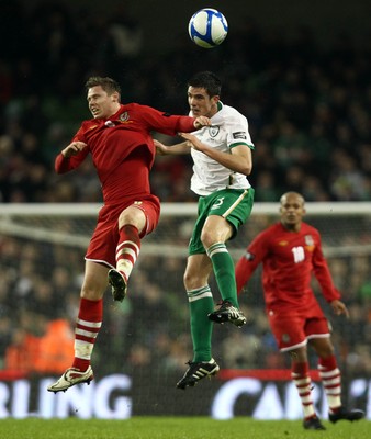 08.02.11 - Republic of Ireland v Wales - Carling Nations Cup -  Ireland's Ciaran Clarke challenges Simon Church of Wales for the ball 