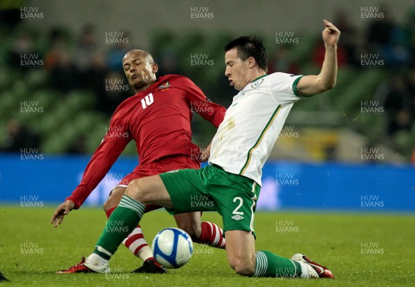 08.02.11 - Republic of Ireland v Wales - Carling Nations Cup -  Ireland's Sean St Ledger tackles Robert Earnshaw of Wales 
