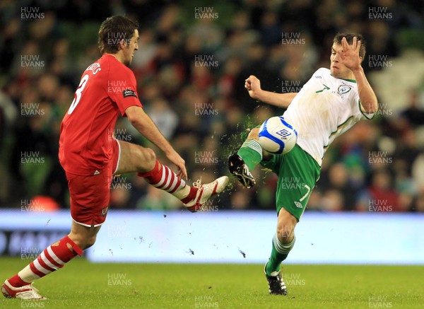 08.02.11 - Republic of Ireland v Wales - Carling Nations Cup -  Seamus Coleman of Ireland challenges Sam Ricketts of Wales for the ball 