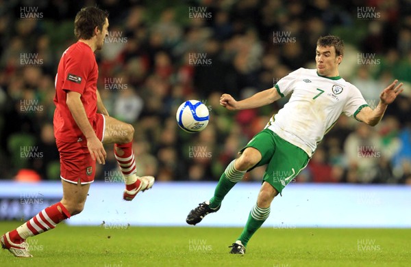 08.02.11 - Republic of Ireland v Wales - Carling Nations Cup -  Seamus Coleman of Ireland challenges Sam Ricketts of Wales for the ball 