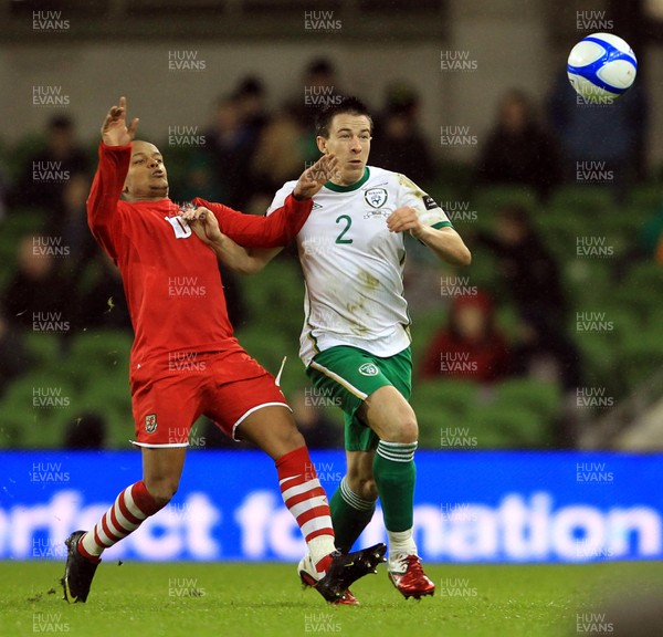08.02.11 - Republic of Ireland v Wales - Carling Nations Cup -  Rob Earnshaw of Wales challenges Sean St. Ledger of Ireland for the ball 