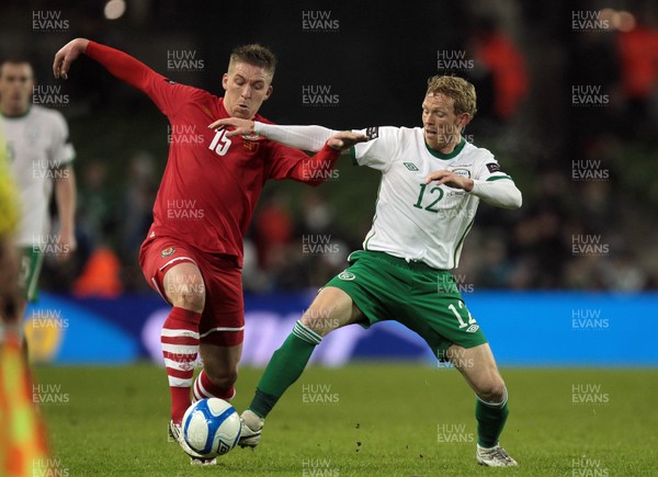 08.02.11 - Republic of Ireland v Wales - Carling Nations Cup -  Ireland's Paul Green tackles Freddy Eastwood of Wales 