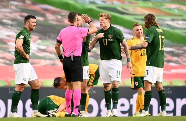 111020 - Republic of Ireland v Wales - UEFA Nations League - James McClean of Republic of Ireland and Ethan Ampadu of Wales before James McClean is shown a red card