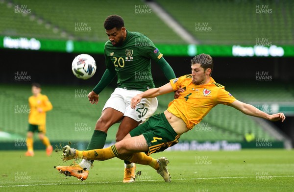 111020 - Republic of Ireland v Wales - UEFA Nations League - Cyrus Christie of Republic of Ireland is tackled by Ben Davies of Wales