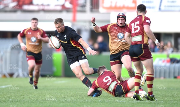 020617 - RGC 1404 v Wales XV - Gareth Anscombe of Wales is tackled by Efan Jones of RGC