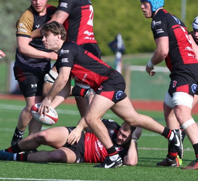 210326 - RGC v Aberavon - Super Rygbi Cymru (SRC) - Elis Horgan of Aberavon passes the ball from the ruck