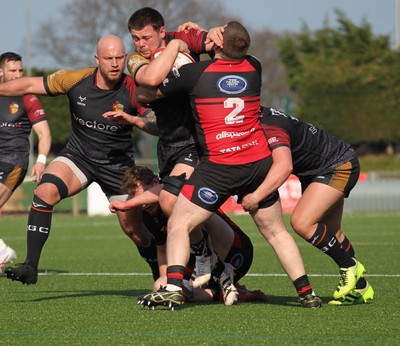 210326 - RGC v Aberavon - Super Rygbi Cymru (SRC) - Harper Chamberlain of RGC is tackled by Luke Davies of Aberavon